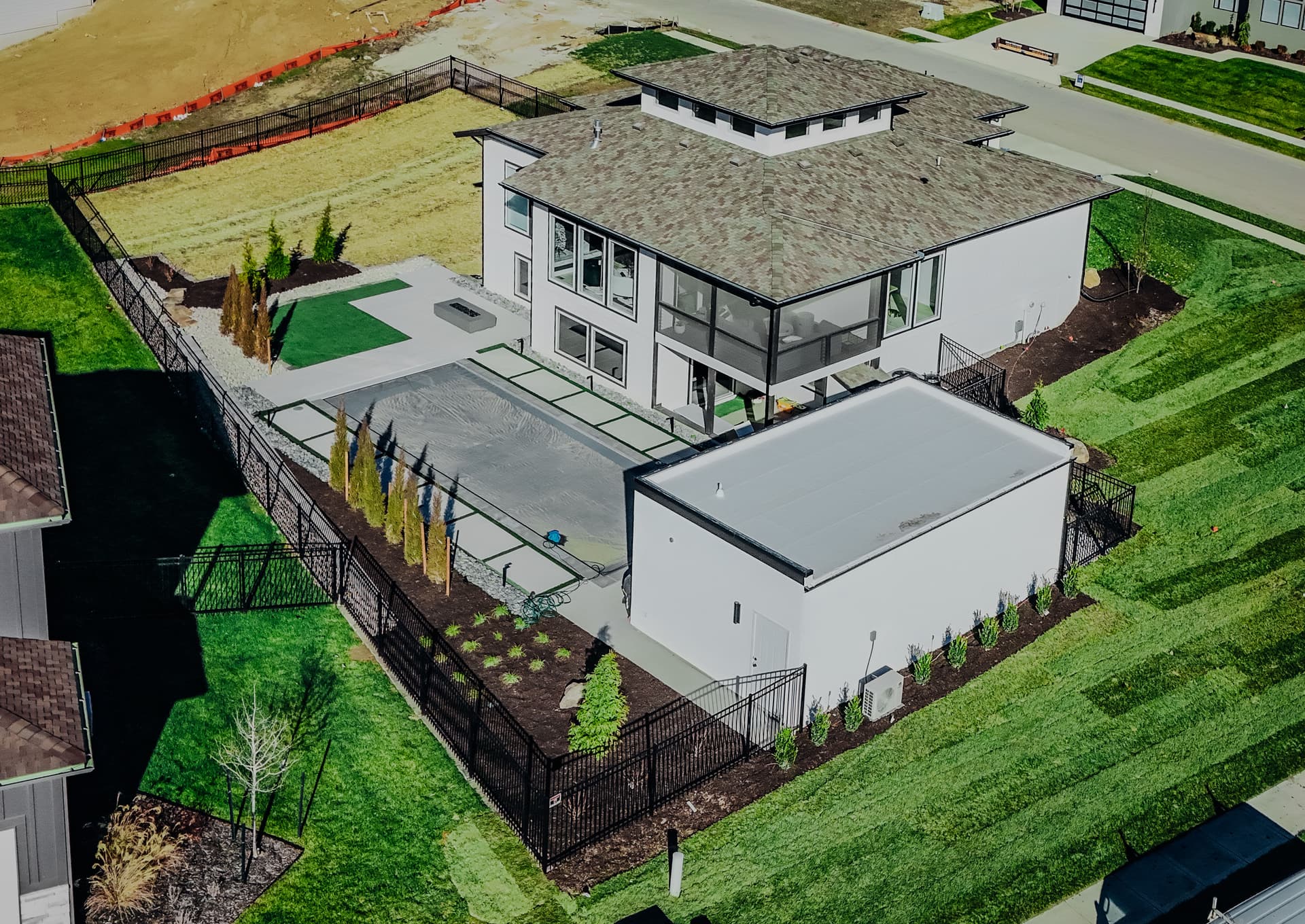 Elevated Outdoor Spaces with Retaining Walls and Pavers in Shawnee KS