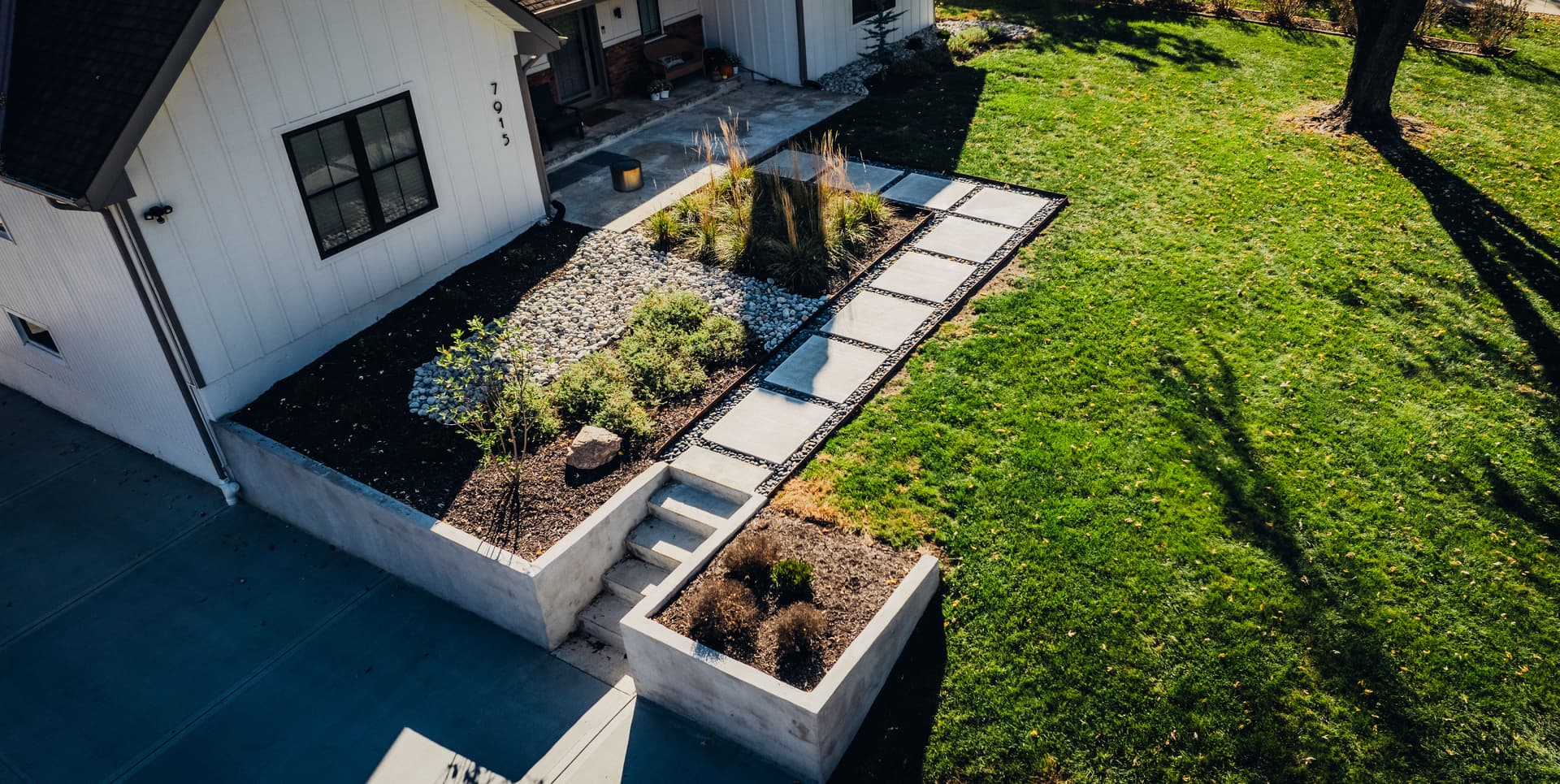 Gallery photos for Elevated Outdoor Spaces with Retaining Walls and Pavers in Shawnee KS: Image #29