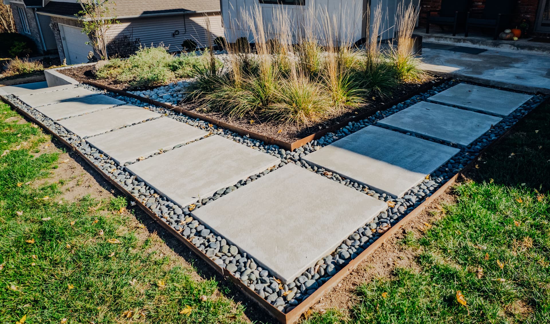 Gallery photos for Elevated Outdoor Spaces with Retaining Walls and Pavers in Shawnee KS: Image #32